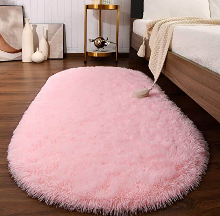 cozy college must have pink fluffy rug for living area or bedroom