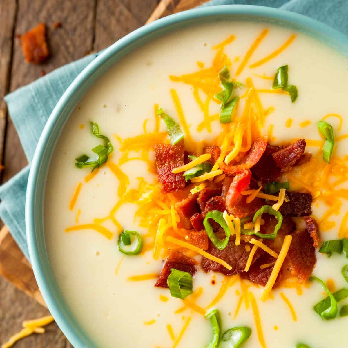 close up of loaded slow cooker baked potato soup recipe