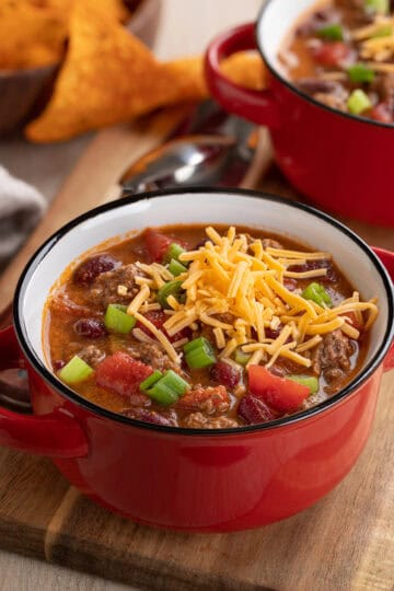 easy crock pot beef chili recipe in a red bowl