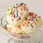 Vanilla Ninja Creami Ice Cream topped with sprinkles served in a clear glass bowl