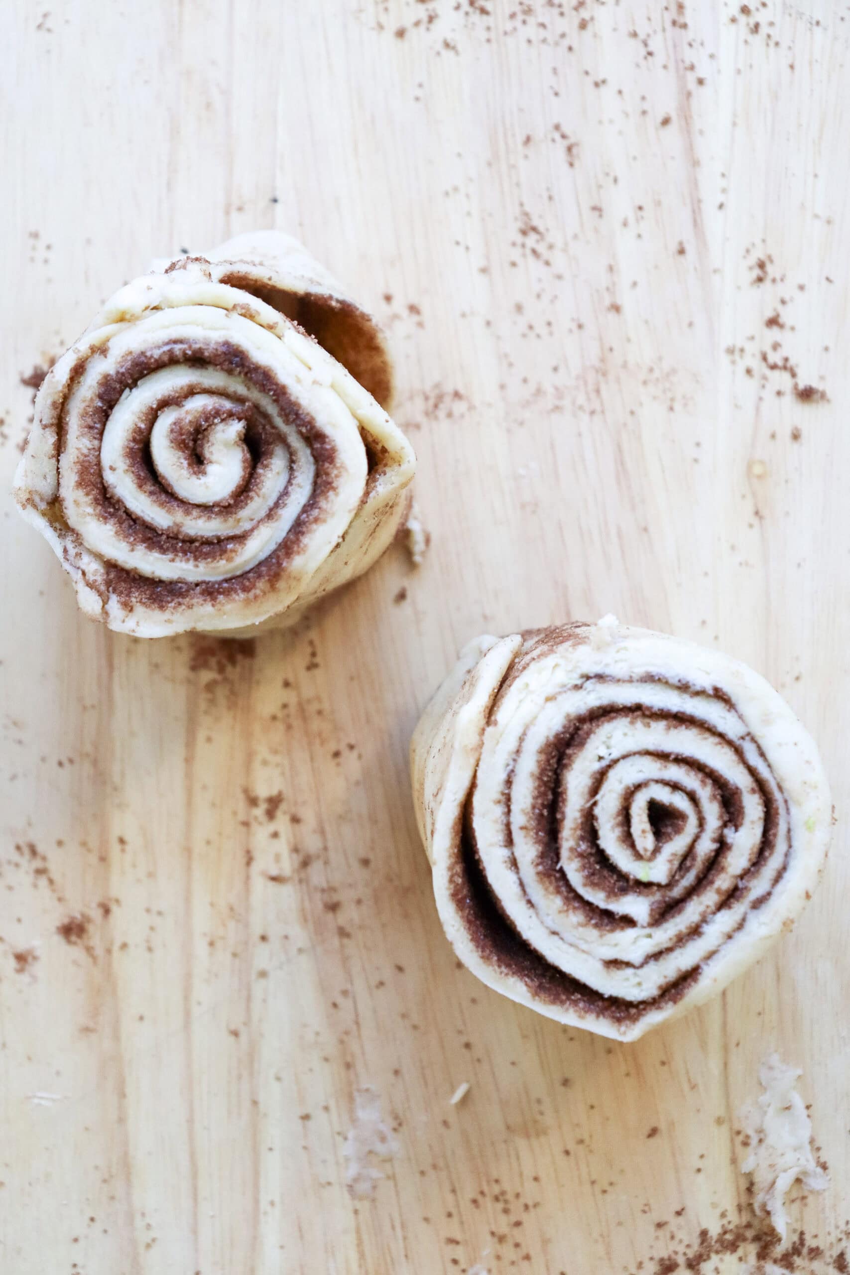 homemade cinnamon rolls cut before baked