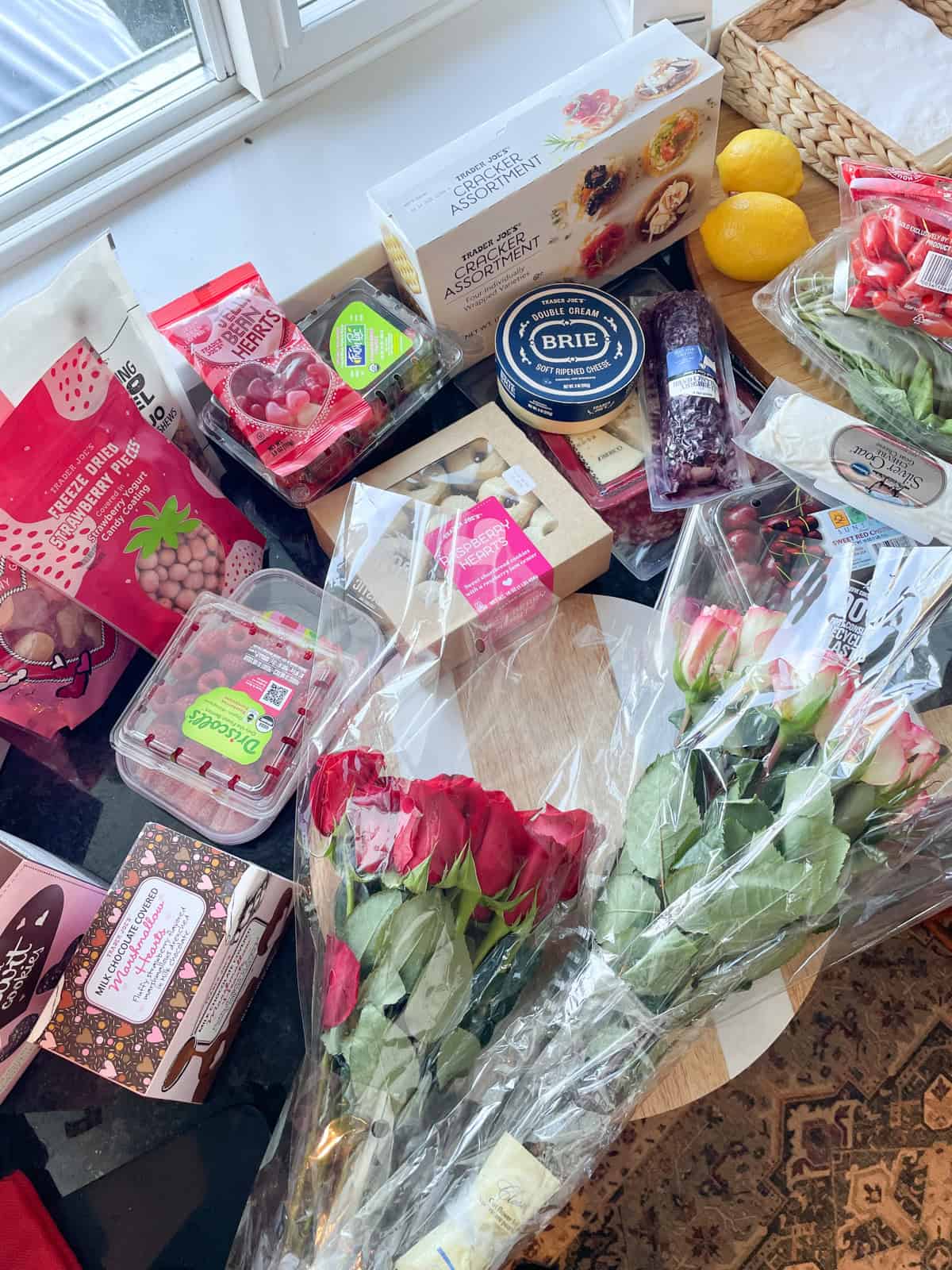 valentines charcuterie ingredients on a counter top after shopping at Trader Joes