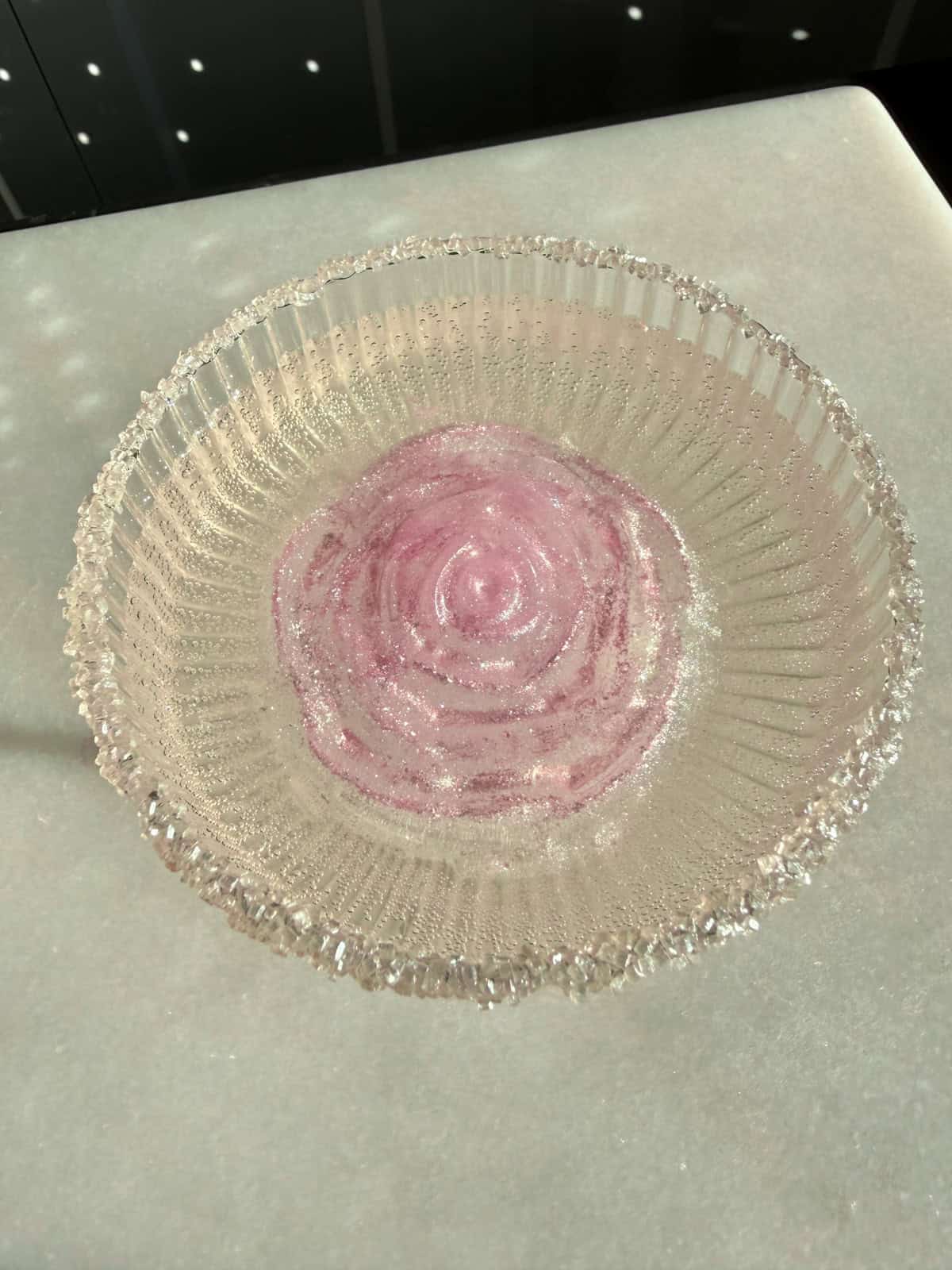 bridgerton cocktail for bridgerton watch party with rose ice cube and prosecco