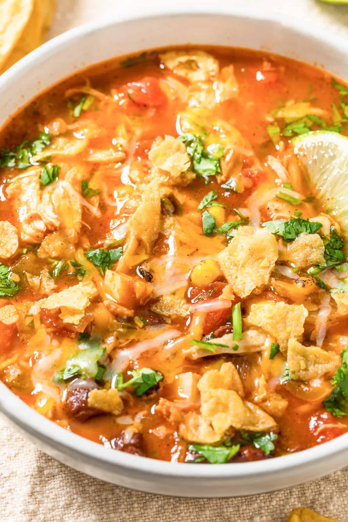 slow cooker tortilla soup in a white bowl for fall