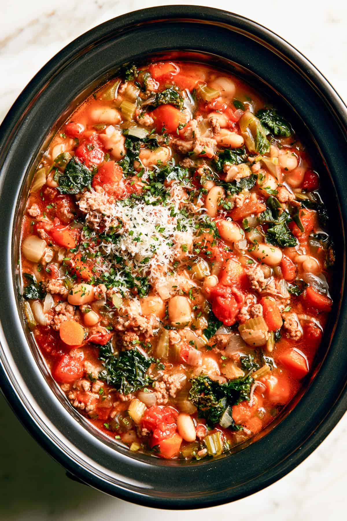 Italian sausage with white beans soup in a slow cooker