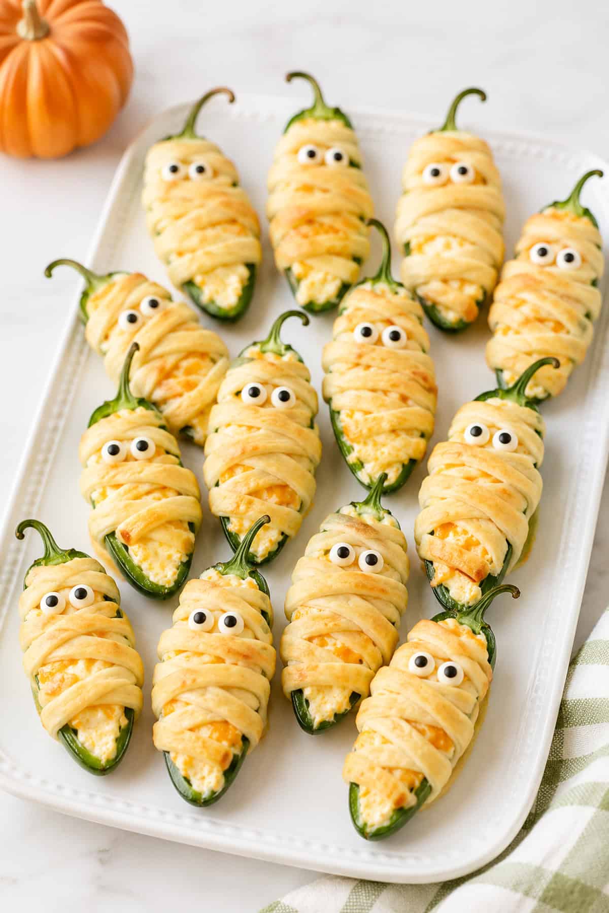 mummy jalapeno poppers wrapped with crescent roll dough