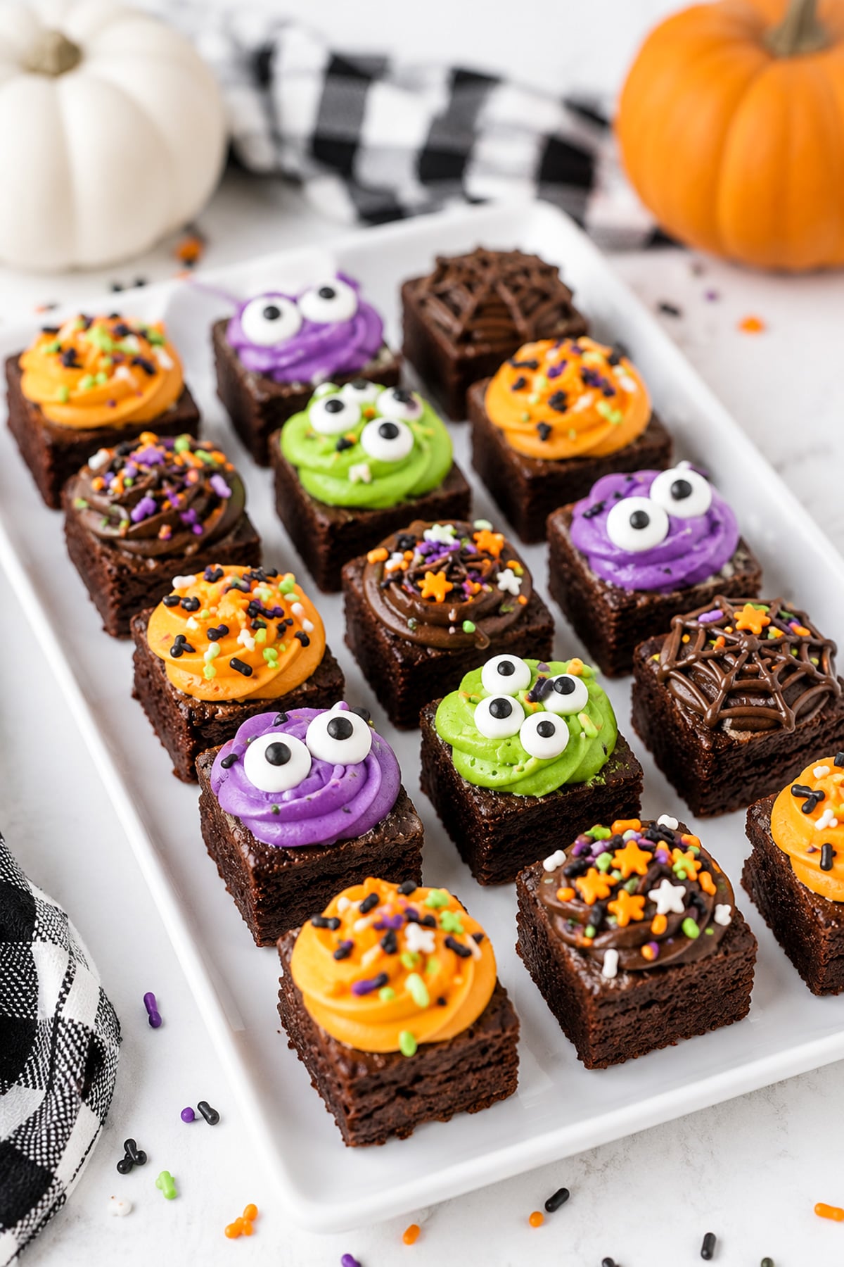 halloween brownie bites on a white plate