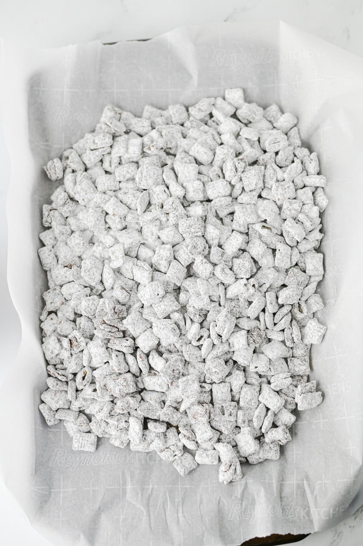 let the muddy buddies rest for an hour before adding the candy