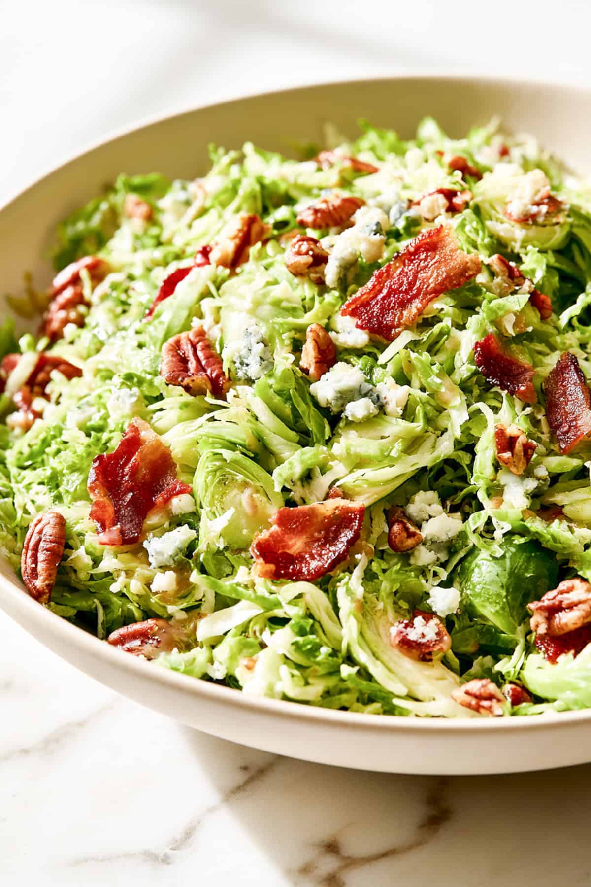 easy brussel sprouts salad with shaved raw brussel sprouts